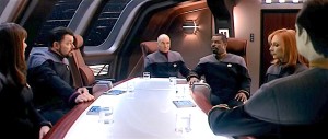 Science fiction (Star Trek) with officers sitting around a meeting table.